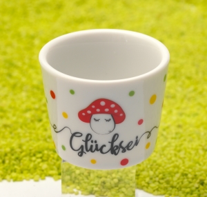 Eierbecher aus Porzellan Glücksei
